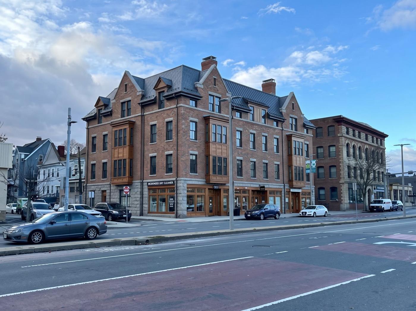 AI-generated concept for Brighton Avenue: Corner exposure, gables, bays and dormers; about 4 levels